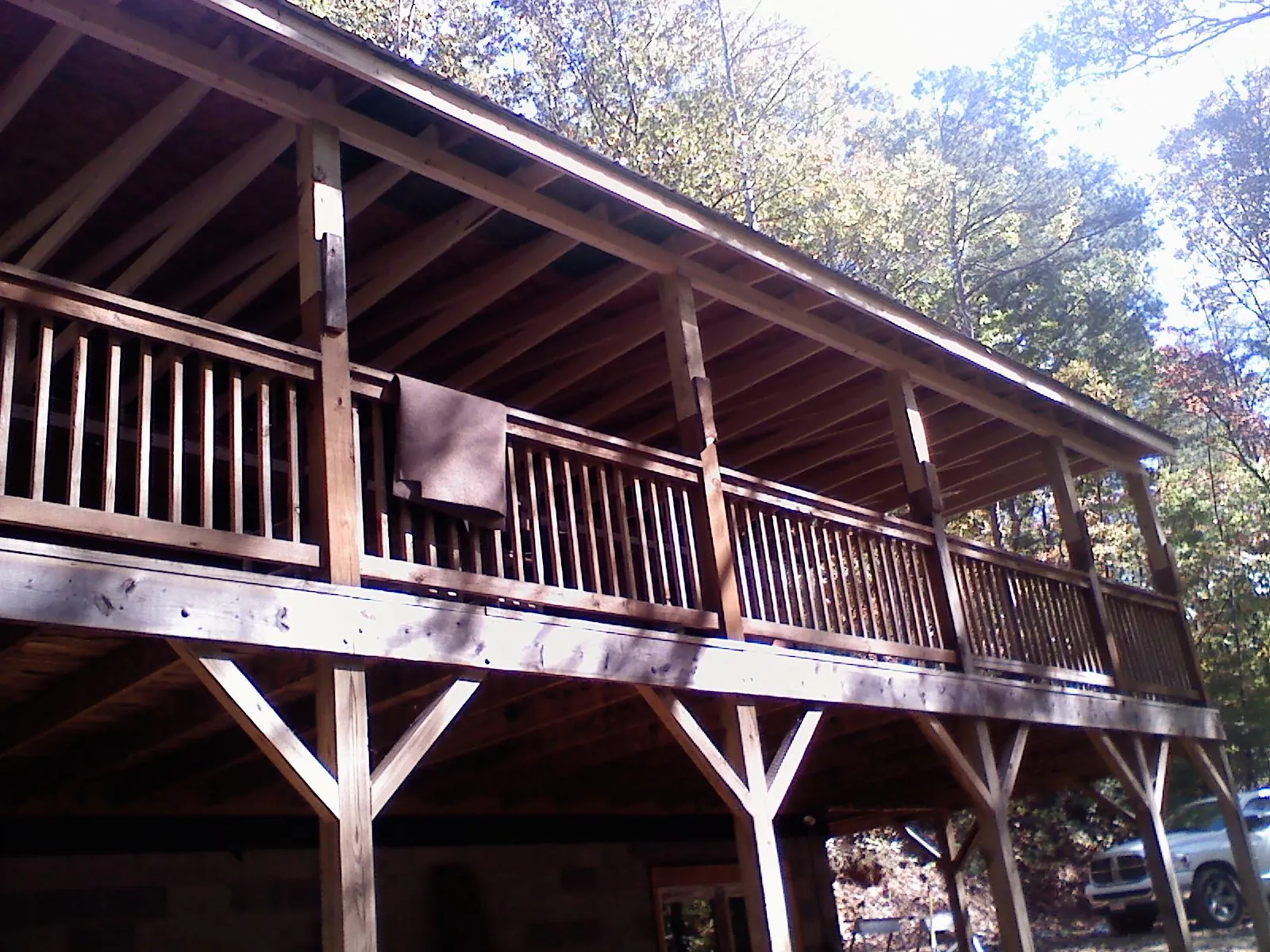Timber framing under a new elevated porch and deck — Roof Leak Repair in Forest Hills by Roofing Brothers